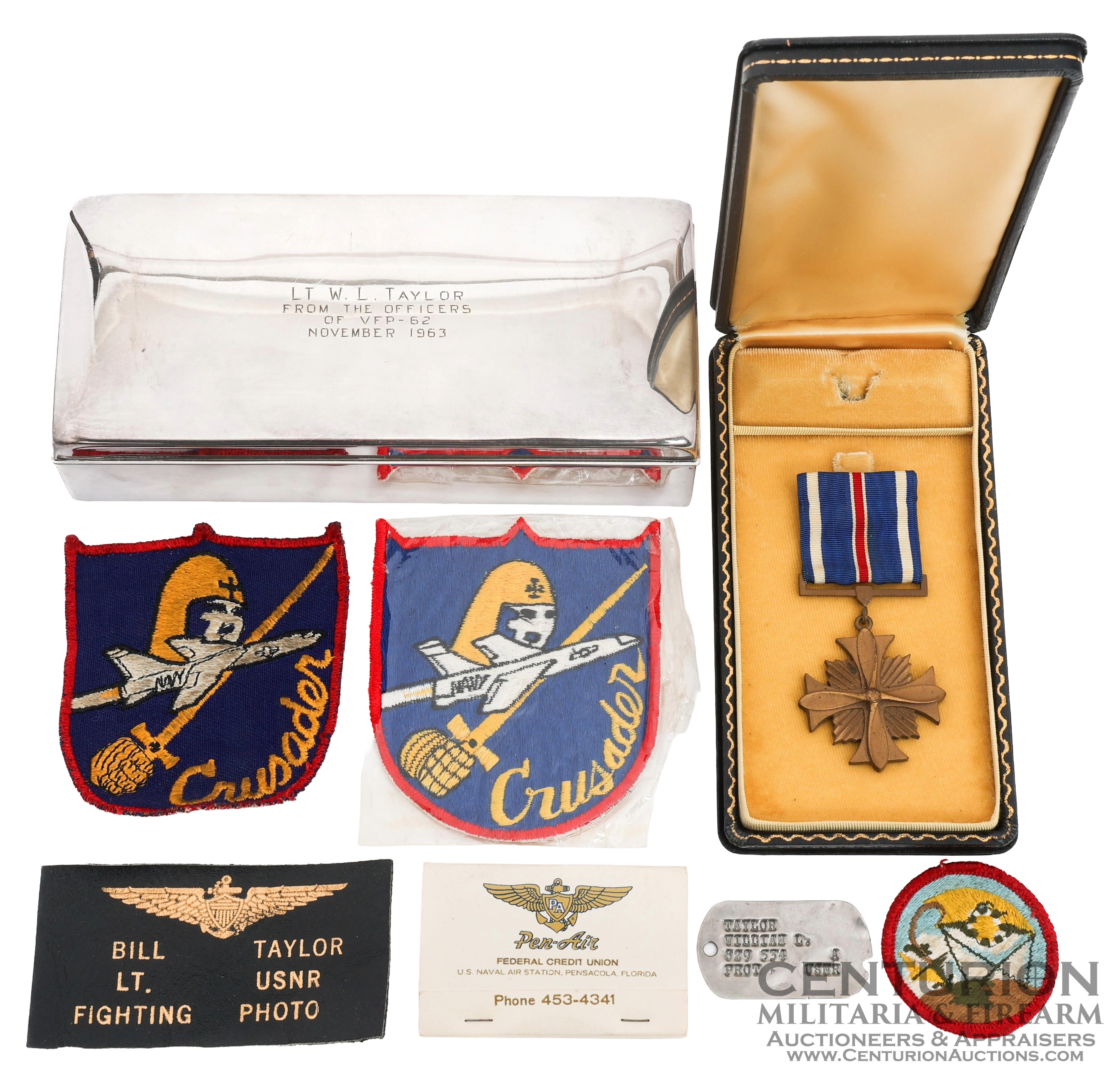 Cuban Missile Crisis VFP-62 Pilot William L. Taylor Grouping | Lieutenant William L. Taylor flew missions for VFP-62 in 1962 during the Cuban Missile Crisis doing low altitude reconnaissance. John F. Kennedy personally decorated his squadron with the Navy Unit Commendation. - 156203